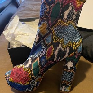 Colorful snake print peep toe booties. Drawstring
